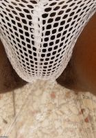 ATK Exotics: Cat (Cat is one frisky chick as she strips and shows off her pussy)